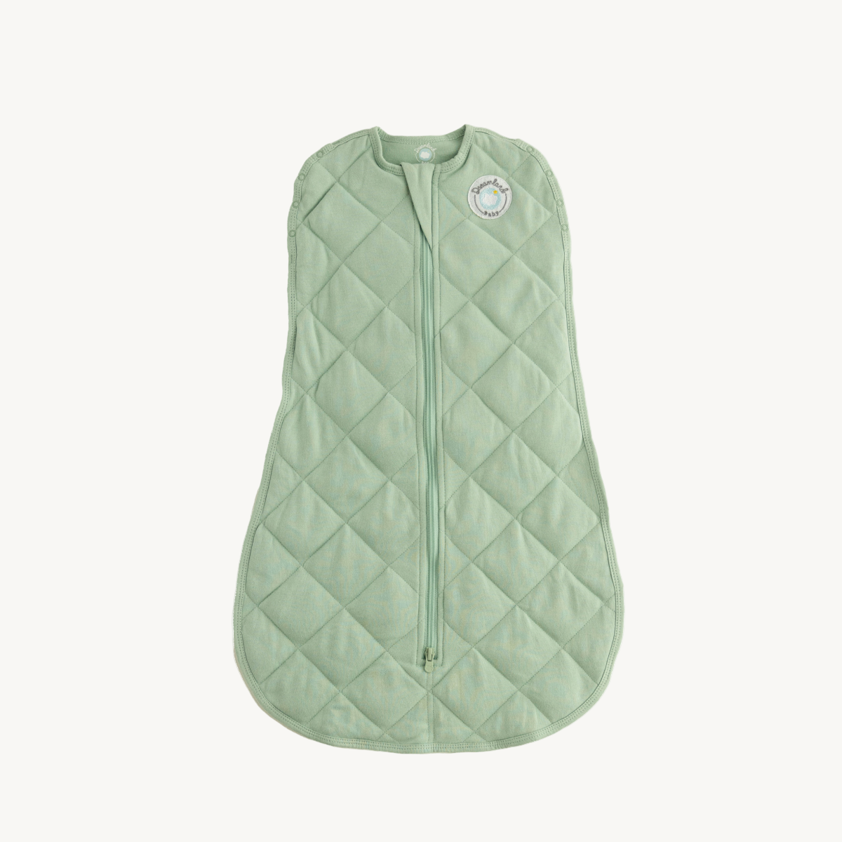 Green quilted baby sleeping bag on a white background