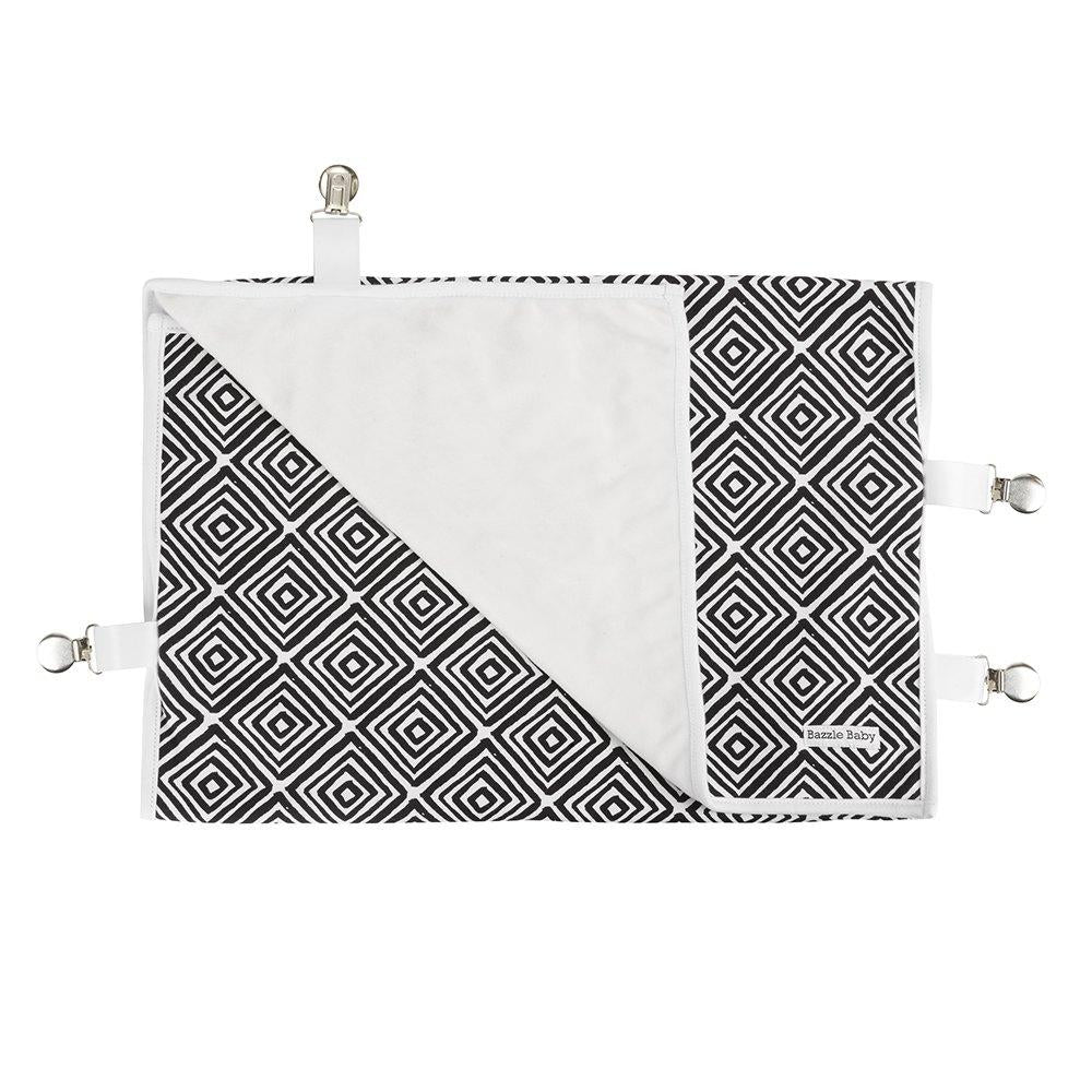 Bazzle Baby GoBlanket in black and white travel stroller blanket with clips and fuzzy fleece back. 