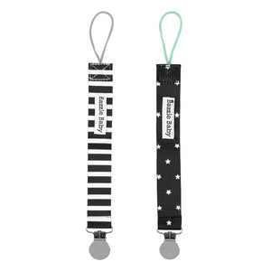 Bazzle Baby Paci Loop attaches pacifiers to bibs and onesies. Black and white stripes and stars.