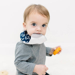 Baby wearing Bandana Drool Bib with Silicone Teether Attached