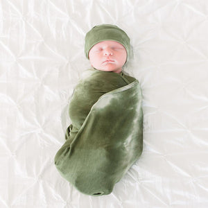 Bazzle Baby Forever Swaddle and Hat Set in olive tie-dye.