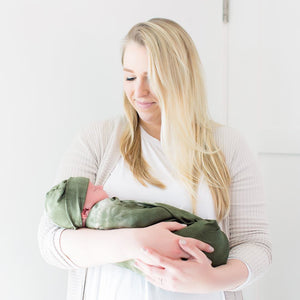 Bazzle Baby Forever Swaddle and Hat Set in olive tie-dye.