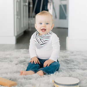 Baby wearing Bandana Drool Bib with Silicone Teether Attached
