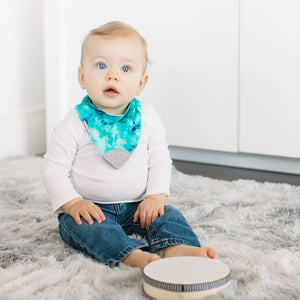Baby wearing Bandana Drool Bib with Silicone Teether Attached