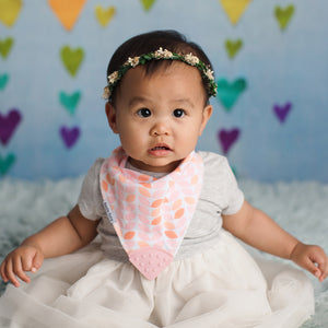 Baby wearing Bandana Drool Bib with Silicone Teether Attached