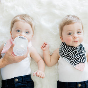 Baby wearing Bandana Drool Bib with Silicone Teether Attached