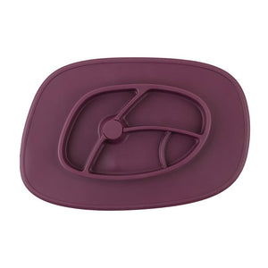 Bazzle Baby Anchor Silicone Mat in cranberry. Suctions to flat surfaces to not fall or slip.