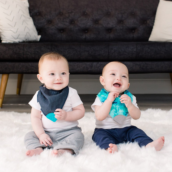 Baby wearing Bandana Drool Bib with Silicone Teether Attached