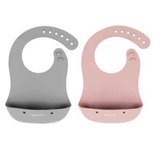 2 - pack of silicone baby bibs with food catching pocket in pink & grey.