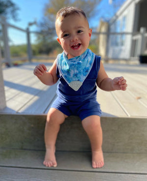 Baby wearing Bandana Drool Bib with Silicone Teether Attached