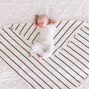 Bazzle Baby Forever Swaddle and Hat Set in classic black and white stripe.