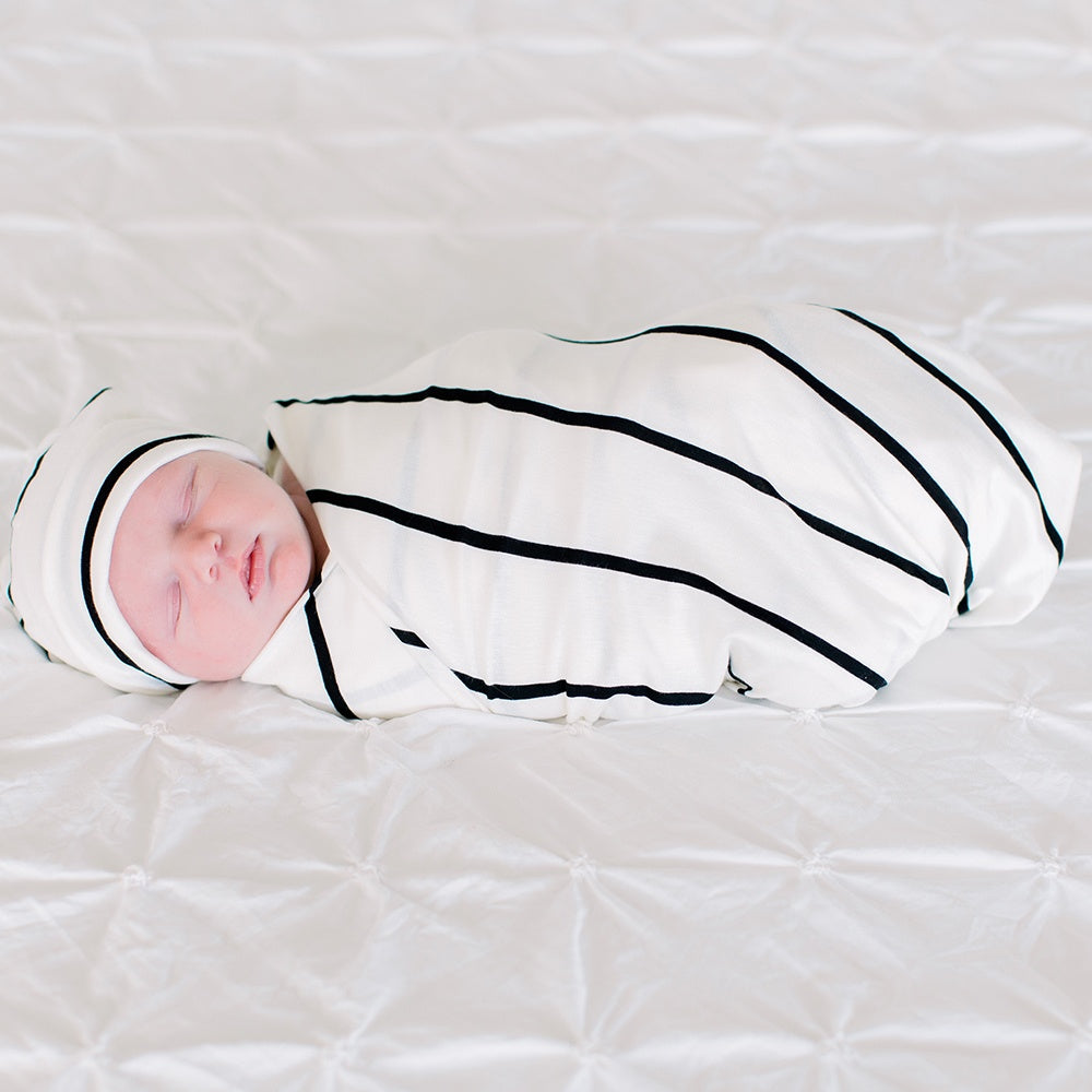 Bazzle Baby Forever Swaddle and Hat Set in classic black and white stripe.