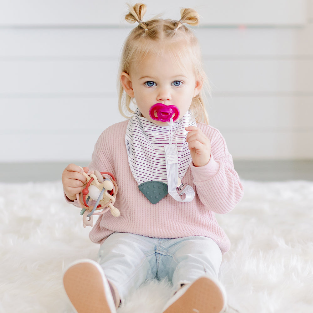 Baby wearing Bandana Drool Bib with Silicone Teether Attached