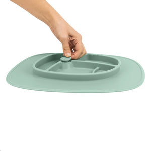 Bazzle Baby Anchor Silicone Mat in sage grey. Suctions to flat surfaces to not fall or slip.