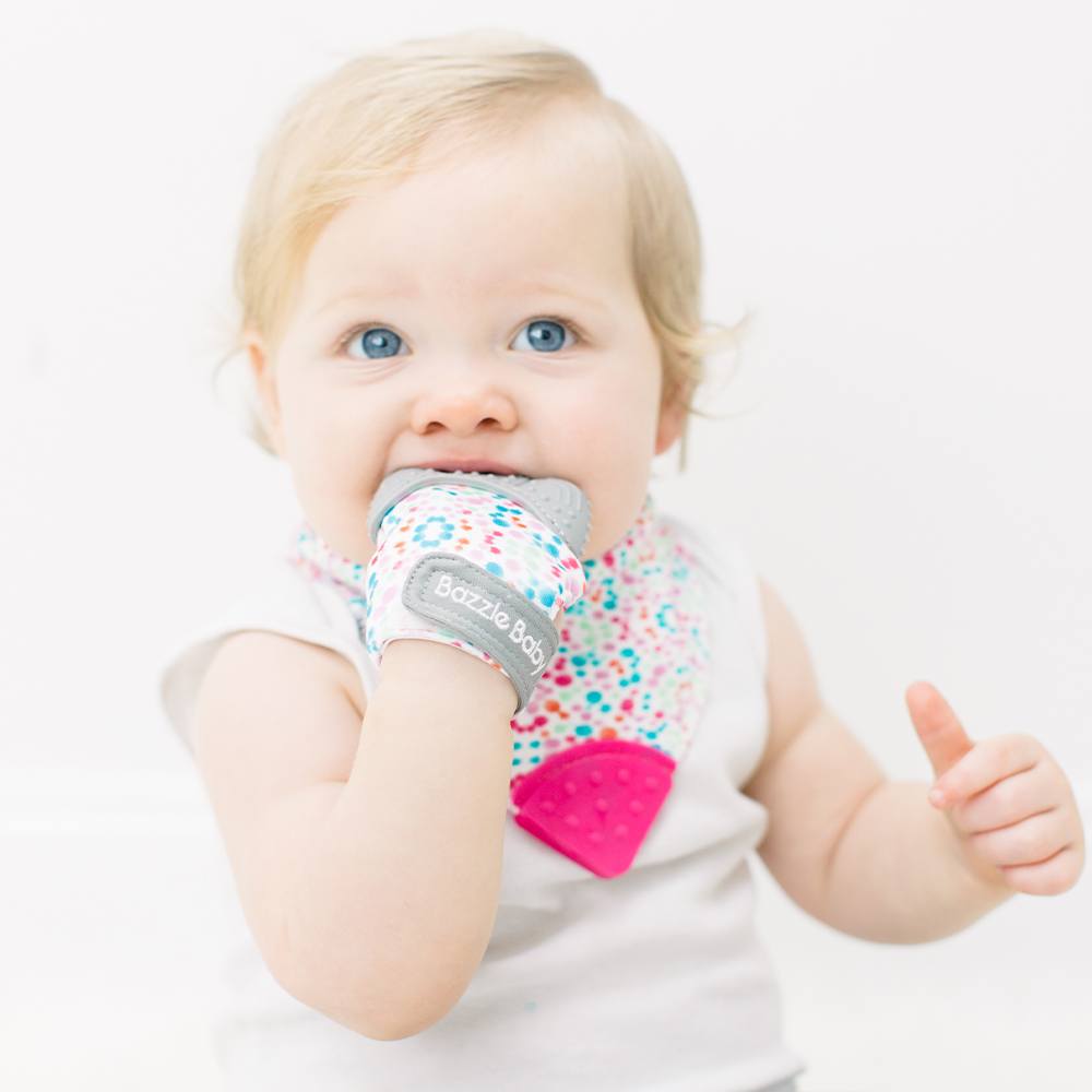 Baby wearing Bandana Drool Bib with Silicone Teether Attached