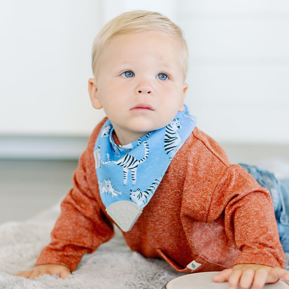 Baby wearing Bandana Drool Bib with Silicone Teether Attached