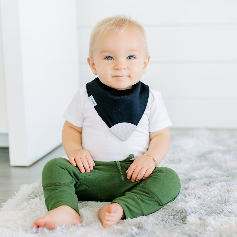 Baby wearing Bandana Drool Bib with Silicone Teether Attached
