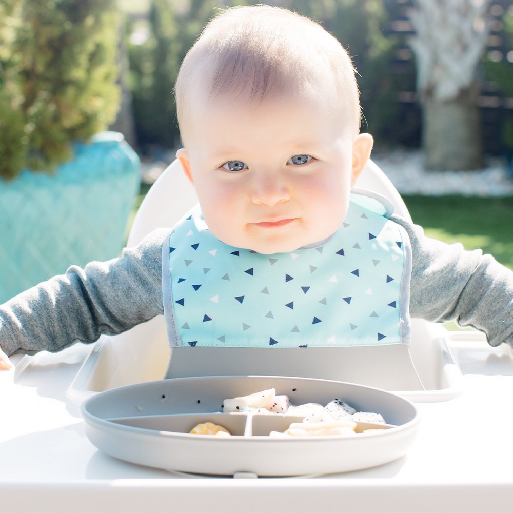 Bazzle Baby Anchor Silicone Plate in cement. Suctions to flat surfaces to not fall or slip.
